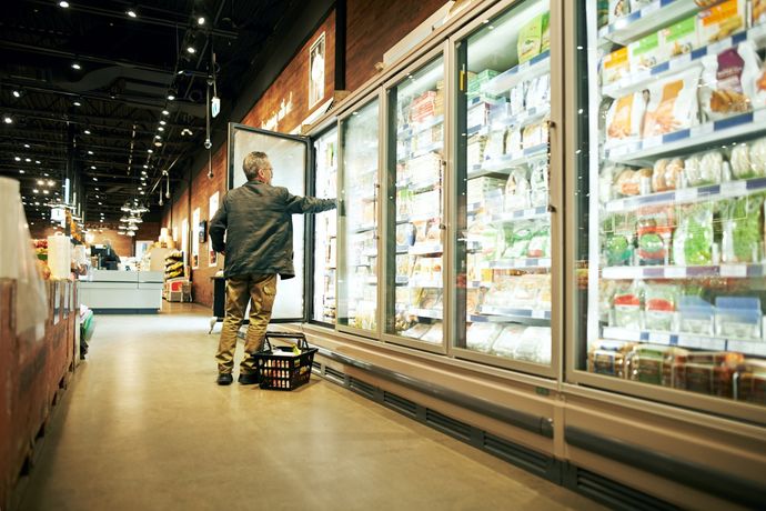 Man Shopping in the Cold Produce Section — Glenorchy, TAS — RBR Refrigeration Sales & Services Pty Ltd Man Shopping in the Cold Produce Section — Glenorchy, TAS — RBR Refrigeration Sales & Services Pty Ltd
